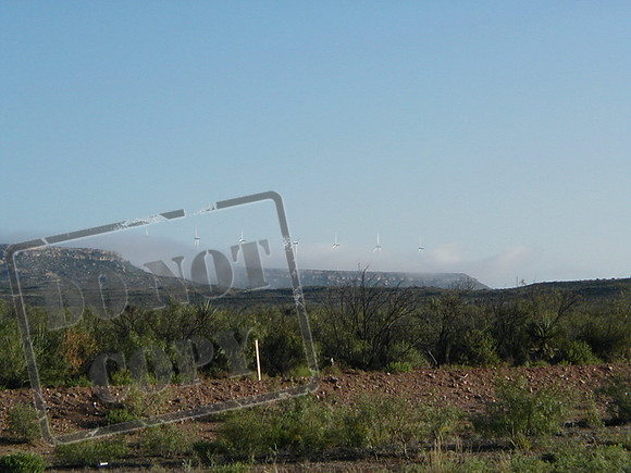 Windmills in fog